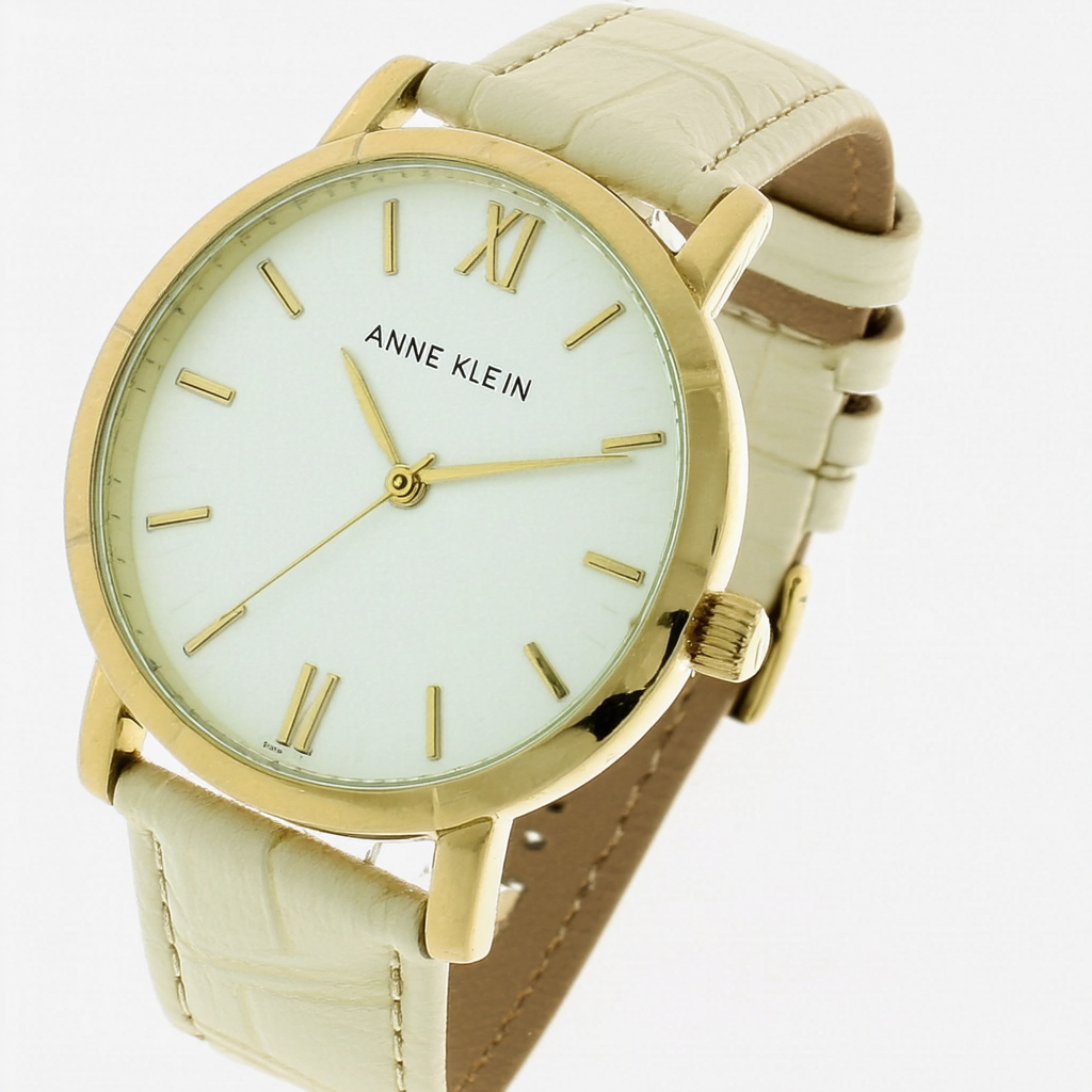 AK Anne Klein Women's 10/9852CMIV Gold-Tone Cream Leather Strap Watch