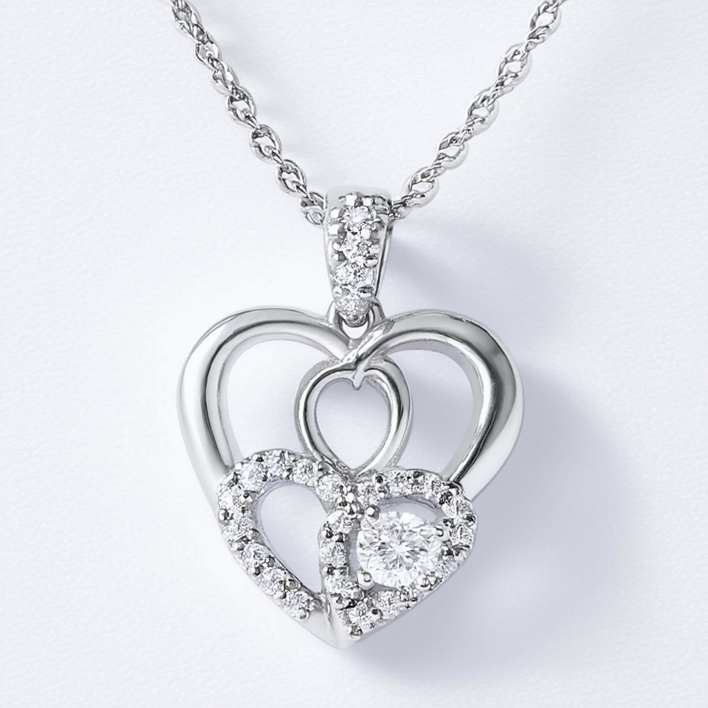 Amazon Collection Sterling Silver Diamond (1/4cttw) Double Heart Pendant Necklace, 18"
