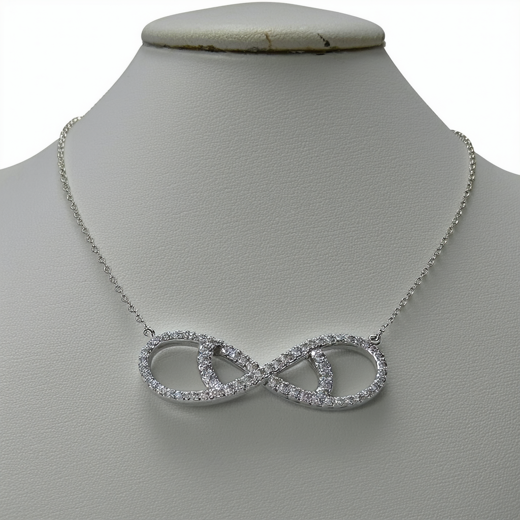 Amazon Collection Sterling Silver Cubic Zirconia Infinity Necklace, 16.5"+2" Extender