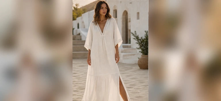 Model wearing a white linen resort dress